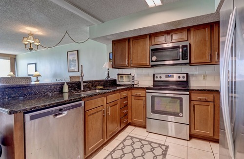 Wilmington Beach Condo | Pelican Watch 104–Oceanfront condo with private beach access, Jacuzzi & pool