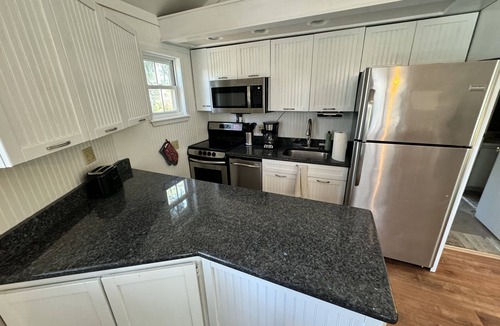 Night Heron House | Pet Friendly Night Heron Bungalow - 2 Bedroom, 2 Bath, 5m walk to beach and pool
