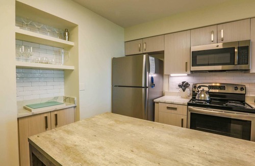 Isle of Palms Condo | Professionally Decorated Corner Condo with Ocean Views, Covered Balcony & Access to Community Pool