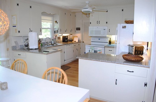 North Litchfield Beach House | Second row home nestled beneath canopy of trees located at North Litchfield Beach.