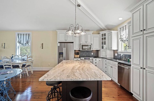 Blue Heron Lake House | Serene Lakeside Retreat, Golf Cart Included, 126 Sea Otter Lane