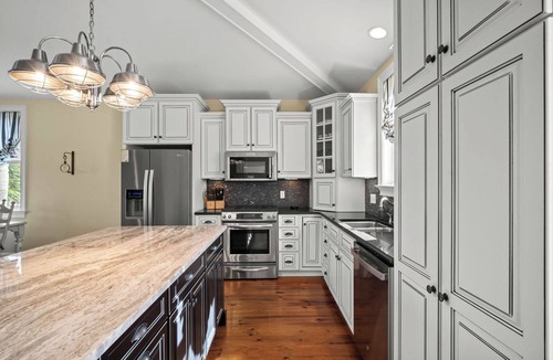 Blue Heron Lake House | Serene Lakeside Retreat, Golf Cart Included, 126 Sea Otter Lane