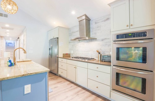 West Beach House | Steps to Beach! Private Heatable* Pool, Two Primary Suites, Bunk Bedroom, Two Dens & Terrific Patio