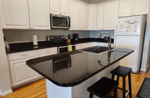 Waters Edge House | Stunning River Views-Easy Walk to Beach & Shops-Pool and Day dock!-3BR Townhome