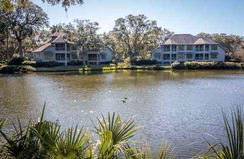 Kiawah Island Villa | Sunroom with lagoon views to enjoy nature! Discounts for long, off-season stays!