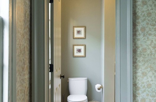 Harleston Village Bed & Breakfast | The Nicholas Veranda King Suite- 1 Block to King