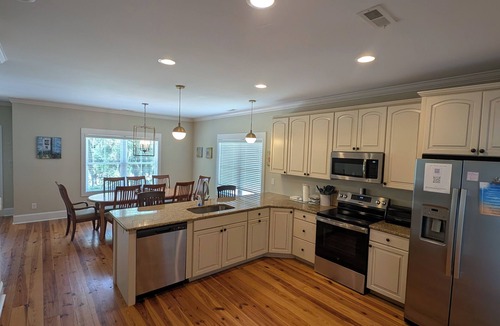 North Litchfield Beach House | Visit Sandnapper! A 4bed/4bth sanctuary moments from golf courses and the beach.