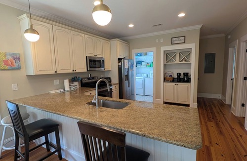 North Litchfield Beach House | Visit Sandnapper! A 4bed/4bth sanctuary moments from golf courses and the beach.