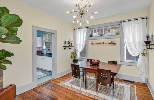 Eau Claire House | Walk or bike to Noma or Main Street district from this fun & peaceful retreat.