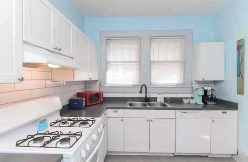 Eau Claire House | Walk or bike to Noma or Main Street district from this fun & peaceful retreat.