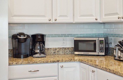 Waters Edge House | Water's Edge 103 - Bright 3BR/3BA Townhome - Pool - Fishing Dock