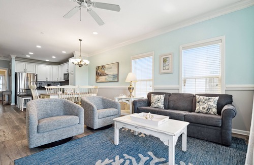 Waters Edge House | Water's Edge 114 - River Daze - Premier Riverfront Townhome - Pool & Fishing Pier!