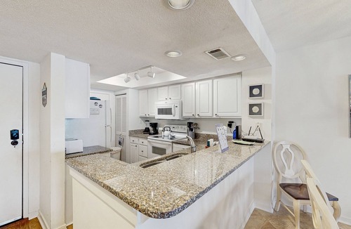 Shelter Cove Condo | Waterfront condo with walkable locale, central AC, washer/dryer, & shared pool