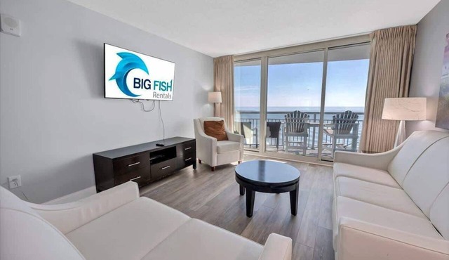 Beachfront condo with ocean views & hot tub
