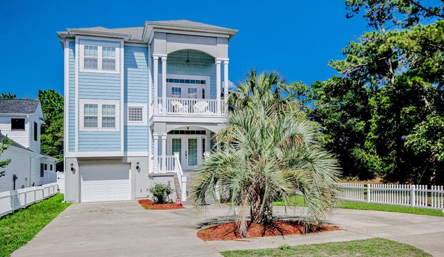 Bright, expansive home near the beach with enclosed yard & large deck