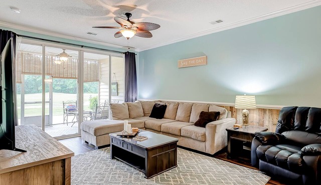Fairway-view condo with screened porch, AC, W/D, pool, hot tub, & tennis
