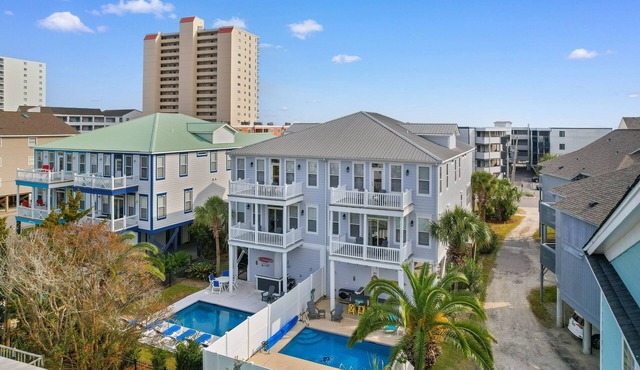 Large 12-Bedroom Duplex Second Row Steps to Shore
