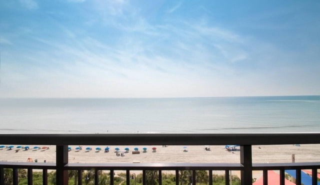 Sun-Kissed Shores Oceanfront Paradise