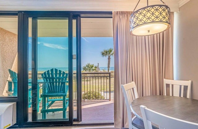 Great 1st floor unit that looks right out onto the beach with direct access