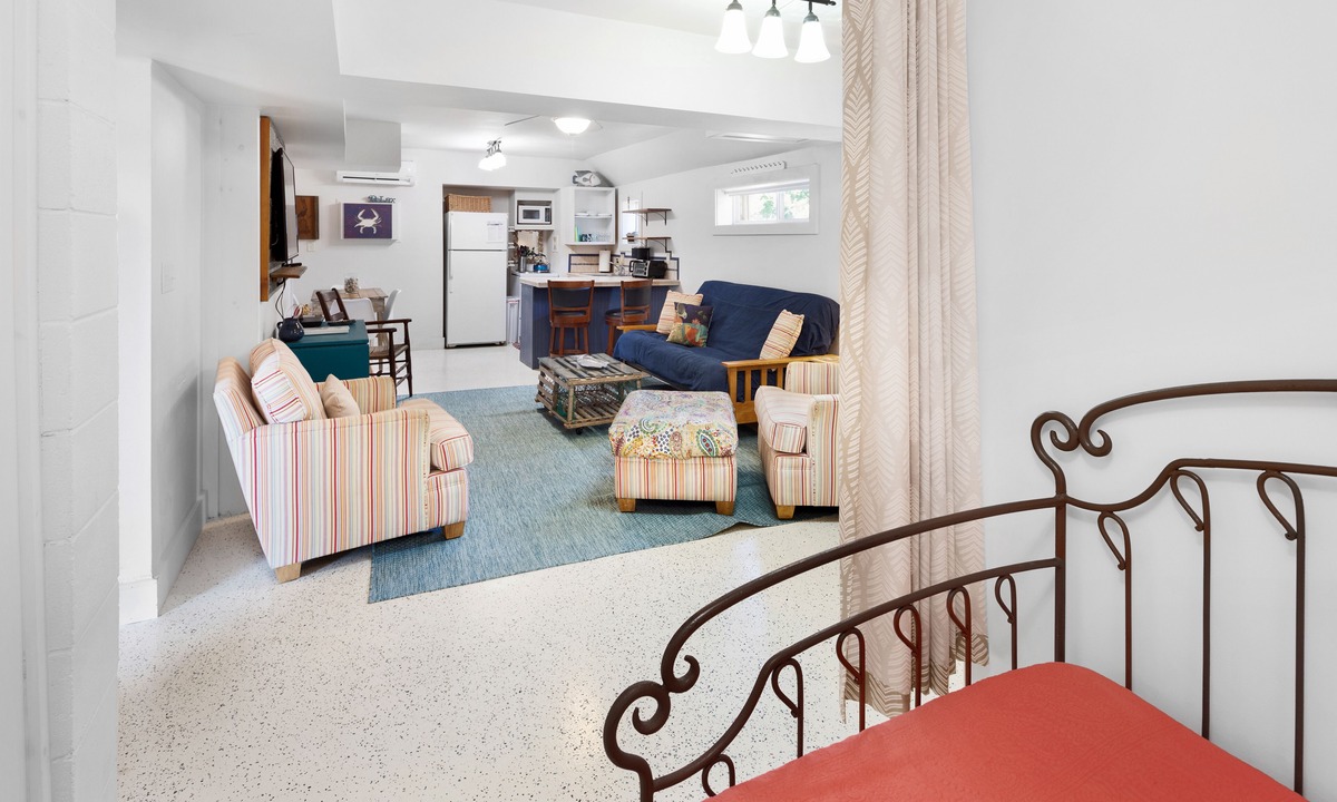 Folly Beach Apartment | TUCKED AWAY. 1/2 block from shops, restaurants and bars.1block to beach.