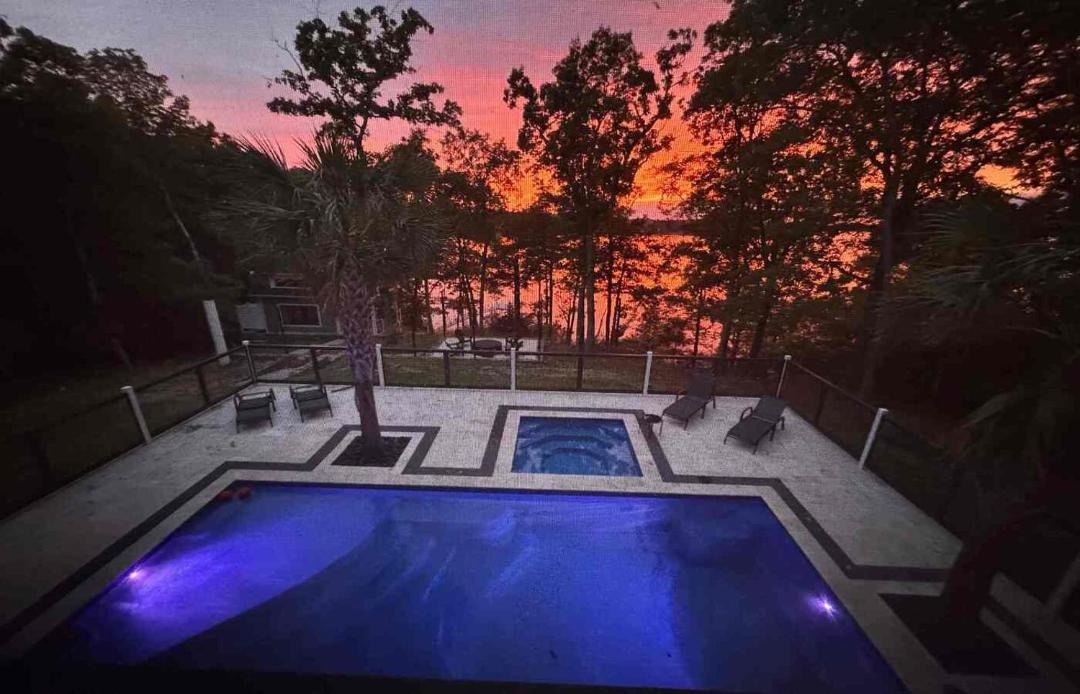 Camden House | Impeccable Lakefront Luxury with Heated Pool, Hot Tub, Private Dock, Game room, Firepit & Sun Set in Amazing Location