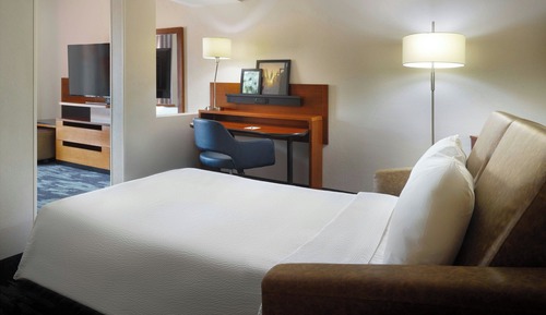 Suite, 1 King Bed with Sofa bed, Hearing Accessible (Transfer Shower)