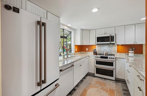 Ocean Ridge Villa | A&J Hideaway:Beautiful Resort Villa Overlooking Golf Course & Tranquil Lagoon; Screened Porch