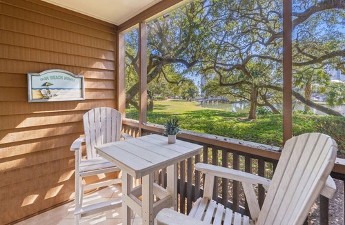 Arcadian Shores Condo | Laurel Ct 104 in Kingston 1st floor, Pool, Beach