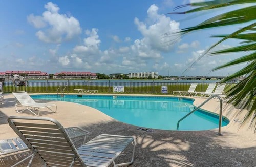 Waters Edge House | 126 Waters Edge! Panoramic River Views, Large Screen Porch, Community Pool & Dock
