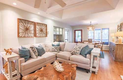 West Beach Condo | Enjoy Stunning River Views, Community Pool & Beautiful Furnishings, Dog Friendly. Walk to Beach!