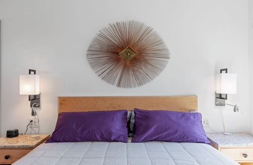 Folly Beach Hotel | Boutique Hotel Folly Room 4: King Studio - cozy porch views of the Folly River