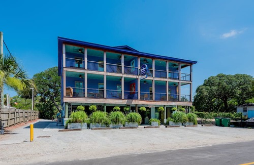Folly Beach Apartment | Perfect Purple Palace Folly Vacation Apt A