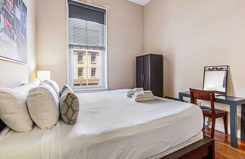 Historic District - North Condo | Contemporary Living on Broughton with King Beds & Parking by Lucky Savannah
