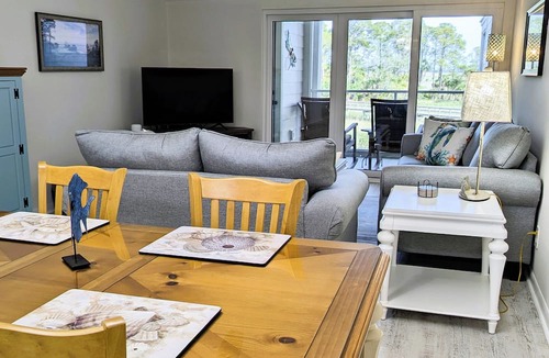 Saint Helena Island Condo | Resort access & golf cart. See reviews. On canal. Short walk to beach. <week-ask
