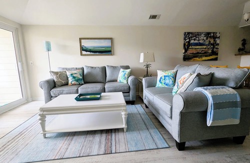Saint Helena Island Condo | Resort access & golf cart. See reviews. On canal. Short walk to beach. <week-ask