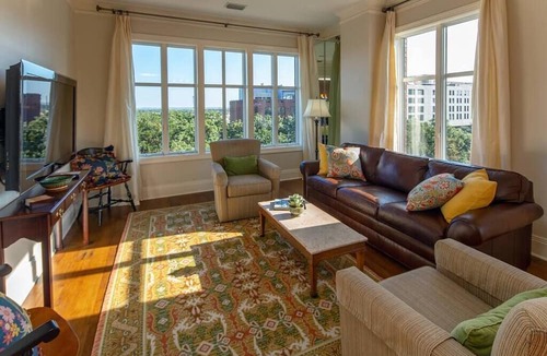 Historic District - North Condo | Step into a spacious, luxury condo that has it all – a premiere location in the heart of the Historic District and floor-to-ceiling window views of the Savannah River, Talmadge Bridge and City Hall. 5th floor.Best river views in the building.