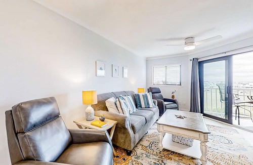 Edisto Island Condo | Inviting waterfront condo with marsh view, shared pool, balcony & central AC