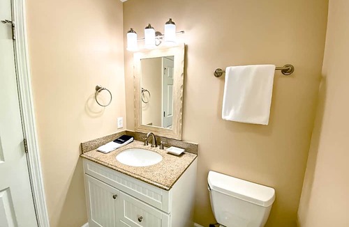 The Cottages Condo | Water view condo with covered deck, on site golf, AC, & WD close to beach