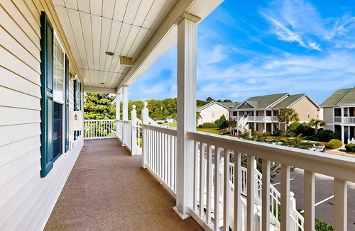 Sunset Beach Condo | Chasing Sunsets: Waterfront condo with pool, tennis, bikes & lagoon/golf views - near the beach