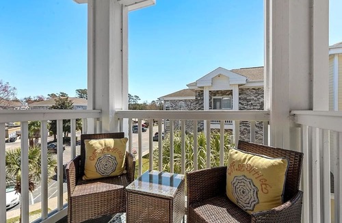 Central Myrtle Beach Apartment | Bright & Cozy Myrtlewood Condo- One Mile to Beach & Broadway with Pools and Golf