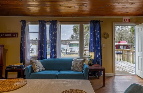 Eutawville Cabin | Lakefront Boathouse with Private Dock & Lake Views in Eutaw Springs, South Carolina