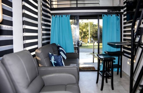 Eutawville Cabin | Tiny Home Retreat with Lake Views & Private Patio in Eutaw Springs, South Carolina