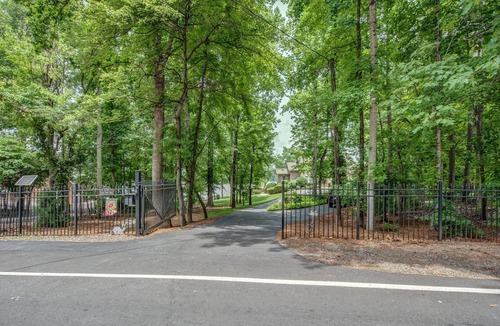 Belmont House | 180 degree lake view, 300 ft. of shoreline, heated pool, and private beach.