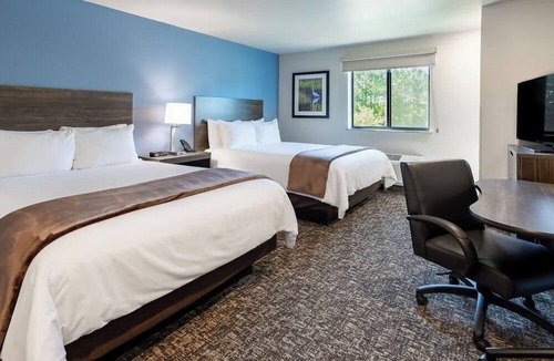 Garner Hotel | Room with Kitchen Close to White Deer Park Nature Center & Raleigh Attractions!