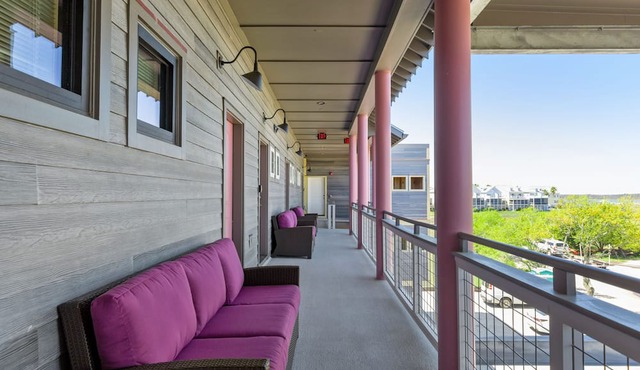 Boutique Hotel Folly Room 4: King Studio - cozy porch views of the Folly River