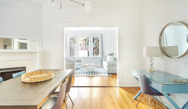 First Floor Condo w/Large Living Area in Historic Dist. by Lucky Savannah