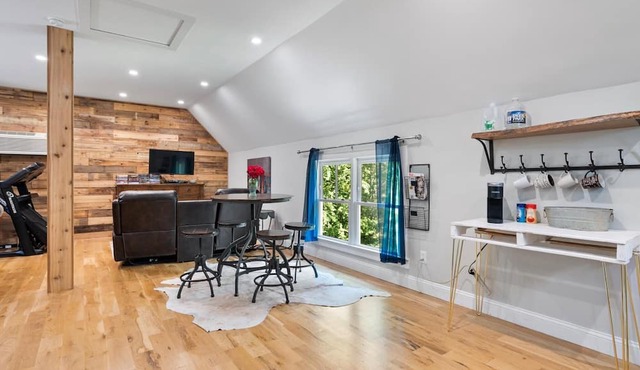 Studio above a detached garage away from main house on a private lot.